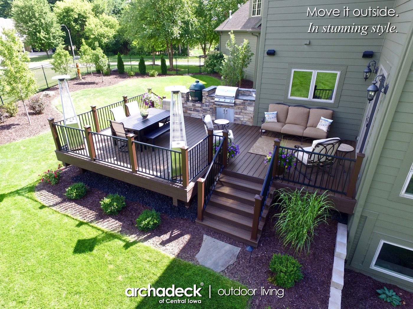 A deck with a table and chairs in the back

AI-generated content may be incorrect.